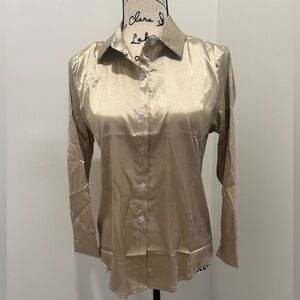 NEW Women’s silk blouse. Size M. Shoulder to cuff is 20 inches. New. Never worn